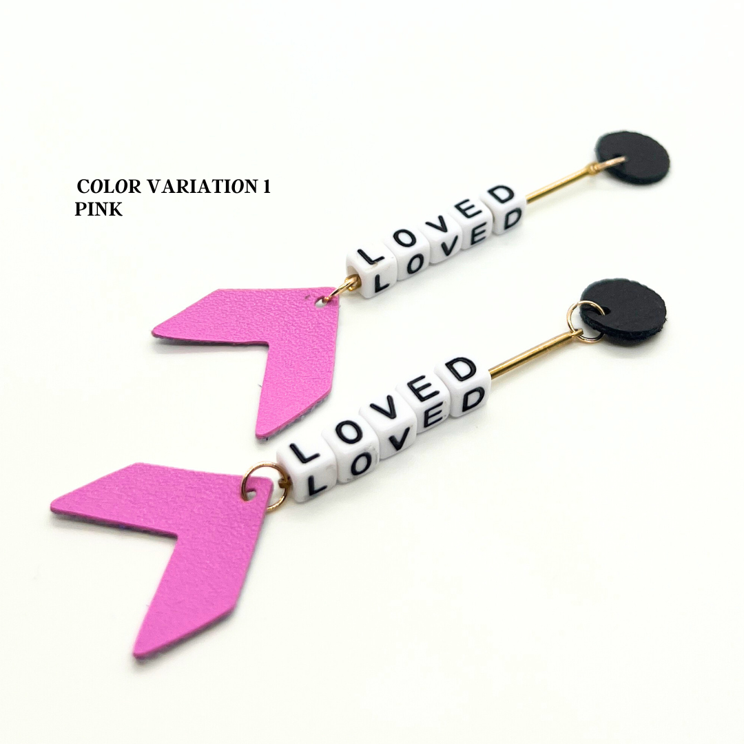 Bold statement earrings in vibrant colors, lightweight and comfortable for all-day wear, handcrafted sustainable leather earrings, eco-friendly jewelry with modern designs, festive holiday earrings perfect for gifting, celestial sun and moon motifs, boho styles with earthy tones, playful Dalmatian print earrings, minimalist earrings styled for the season, bold designs from a small, women-owned business, gift-worthy feather-light earrings, sustainable and recycled leather for eco-conscious fashion
