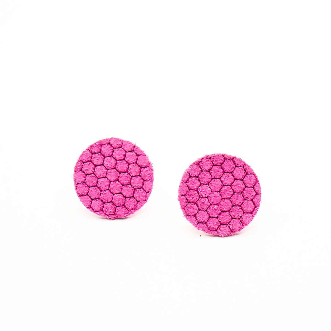 Bold statement earrings in vibrant colors, lightweight and comfortable for all-day wear, handcrafted sustainable leather earrings, eco-friendly jewelry with modern designs, festive holiday earrings perfect for gifting, celestial sun and moon motifs, boho styles with earthy tones, playful Dalmatian print earrings, minimalist earrings styled for the season, bold designs from a small, women-owned business, gift-worthy feather-light earrings, sustainable and recycled leather for eco-conscious fashion