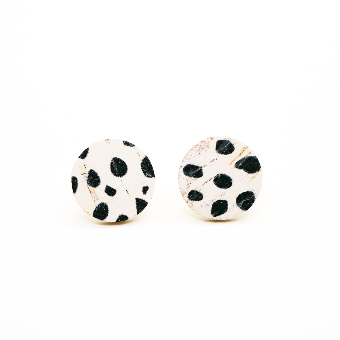 Bold statement earrings in vibrant colors, lightweight and comfortable for all-day wear, handcrafted sustainable leather earrings, eco-friendly jewelry with modern designs, festive holiday earrings perfect for gifting, celestial sun and moon motifs, boho styles with earthy tones, playful Dalmatian print earrings, minimalist earrings styled for the season, bold designs from a small, women-owned business, gift-worthy feather-light earrings, sustainable and recycled leather for eco-conscious fashion