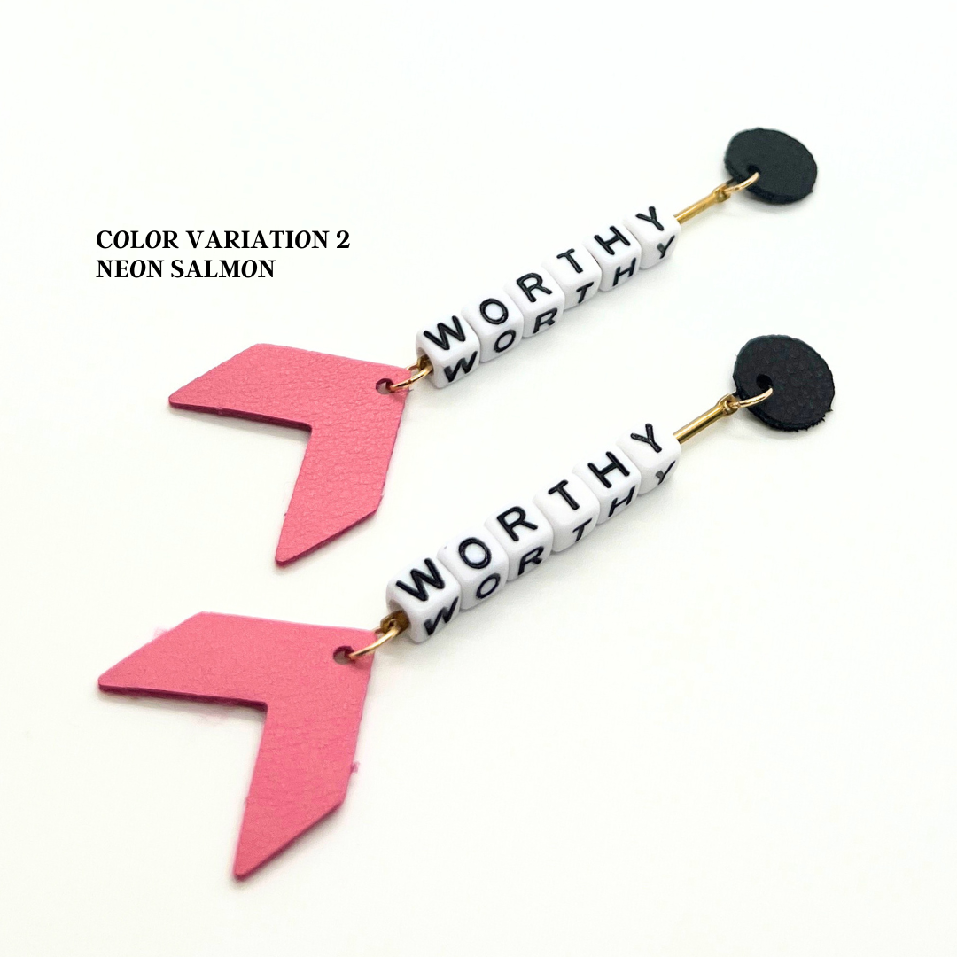 Bold statement earrings in vibrant colors, lightweight and comfortable for all-day wear, handcrafted sustainable leather earrings, eco-friendly jewelry with modern designs, festive holiday earrings perfect for gifting, celestial sun and moon motifs, boho styles with earthy tones, playful Dalmatian print earrings, minimalist earrings styled for the season, bold designs from a small, women-owned business, gift-worthy feather-light earrings, sustainable and recycled leather for eco-conscious fashion