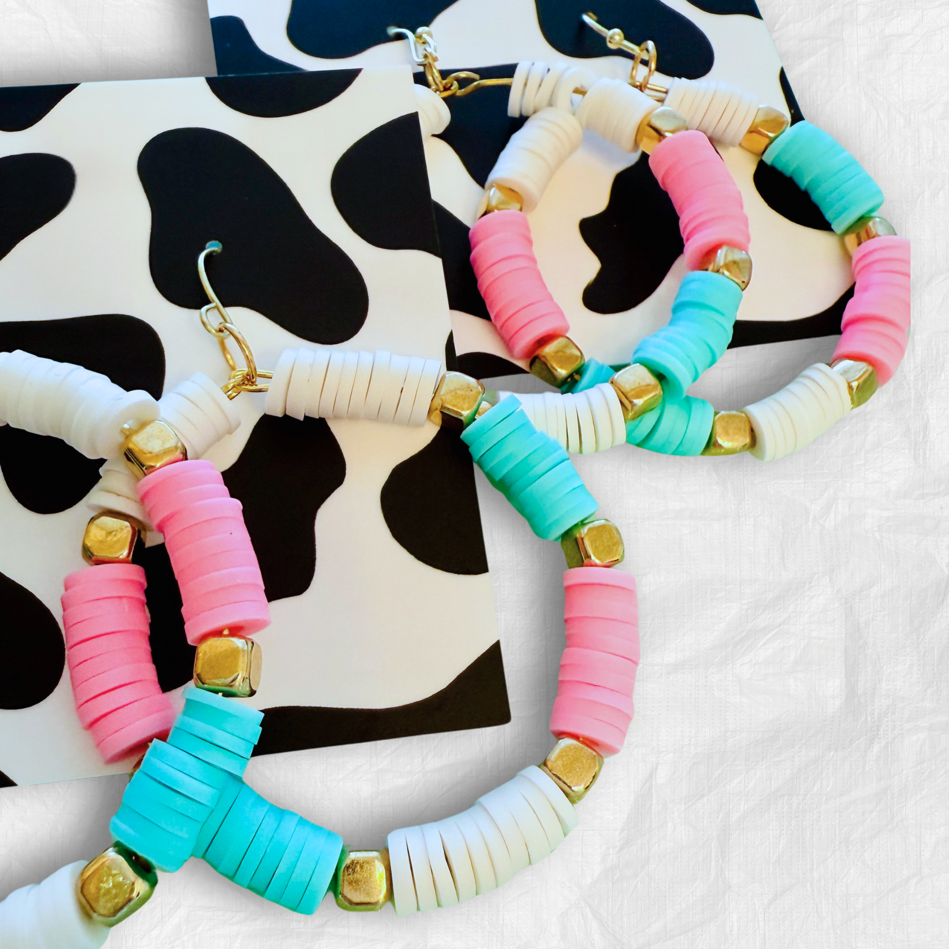 colorful hoop earrings, pastel statement earrings, beachy jewelry, lightweight hoops, handmade jewelry, bold earrings, playful fashion, aesthetic accessories, pastel jewelry, trendy hoops, boho earrings, summer accessories