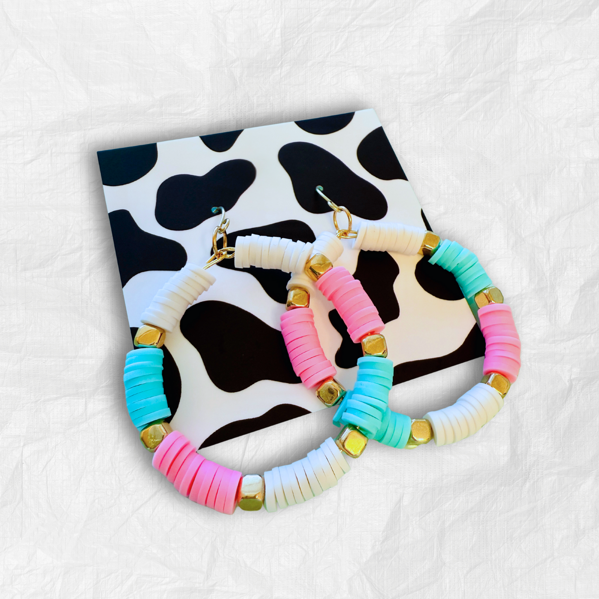 colorful hoop earrings, pastel statement earrings, beachy jewelry, lightweight hoops, handmade jewelry, bold earrings, playful fashion, aesthetic accessories, pastel jewelry, trendy hoops, boho earrings, summer accessories