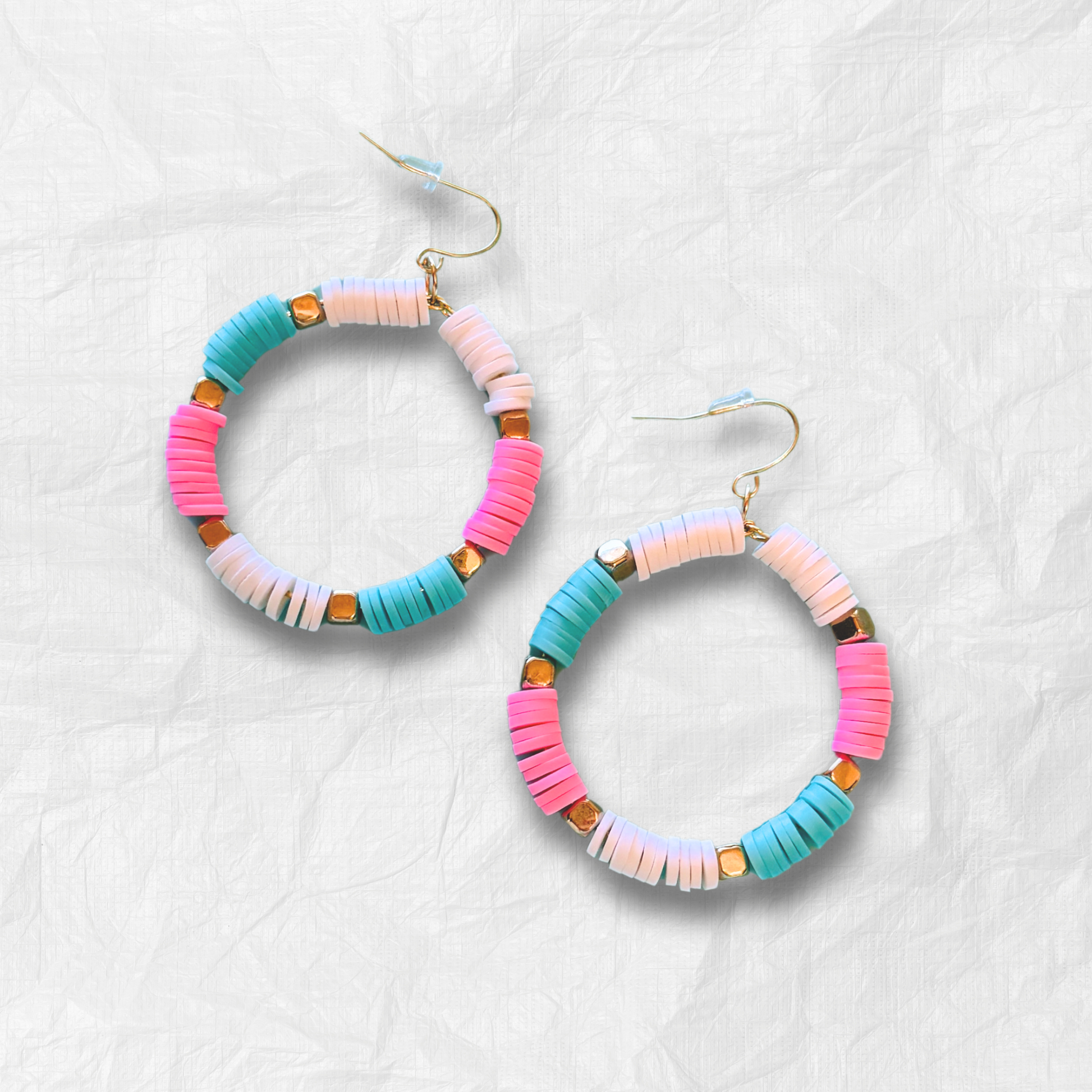 colorful hoop earrings, pastel statement earrings, beachy jewelry, lightweight hoops, handmade jewelry, bold earrings, playful fashion, aesthetic accessories, pastel jewelry, trendy hoops, boho earrings, summer accessories