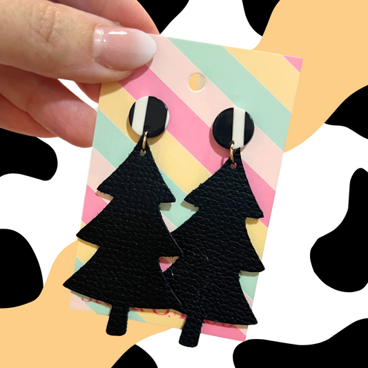 Bold statement earrings in vibrant colors, lightweight and comfortable for all-day wear, handcrafted sustainable leather earrings, eco-friendly jewelry with modern designs, festive holiday earrings perfect for gifting, celestial sun and moon motifs, boho styles with earthy tones, playful Dalmatian print earrings, minimalist earrings styled for the season, bold designs from a small, women-owned business, gift-worthy feather-light earrings, sustainable and recycled leather for eco-conscious fashion