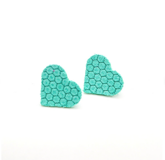 Bold statement earrings in vibrant colors, lightweight and comfortable for all-day wear, handcrafted sustainable leather earrings, eco-friendly jewelry with modern designs, festive holiday earrings perfect for gifting, celestial sun and moon motifs, boho styles with earthy tones, playful Dalmatian print earrings, minimalist earrings styled for the season, bold designs from a small, women-owned business, gift-worthy feather-light earrings, sustainable and recycled leather for eco-conscious fashion