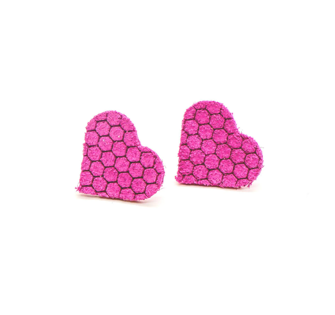 Bold statement earrings in vibrant colors, lightweight and comfortable for all-day wear, handcrafted sustainable leather earrings, eco-friendly jewelry with modern designs, festive holiday earrings perfect for gifting, celestial sun and moon motifs, boho styles with earthy tones, playful Dalmatian print earrings, minimalist earrings styled for the season, bold designs from a small, women-owned business, gift-worthy feather-light earrings, sustainable and recycled leather for eco-conscious fashion